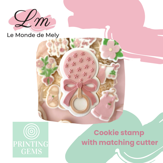 Baby in bloom rattle raised stamp by Le Monde De Mely
