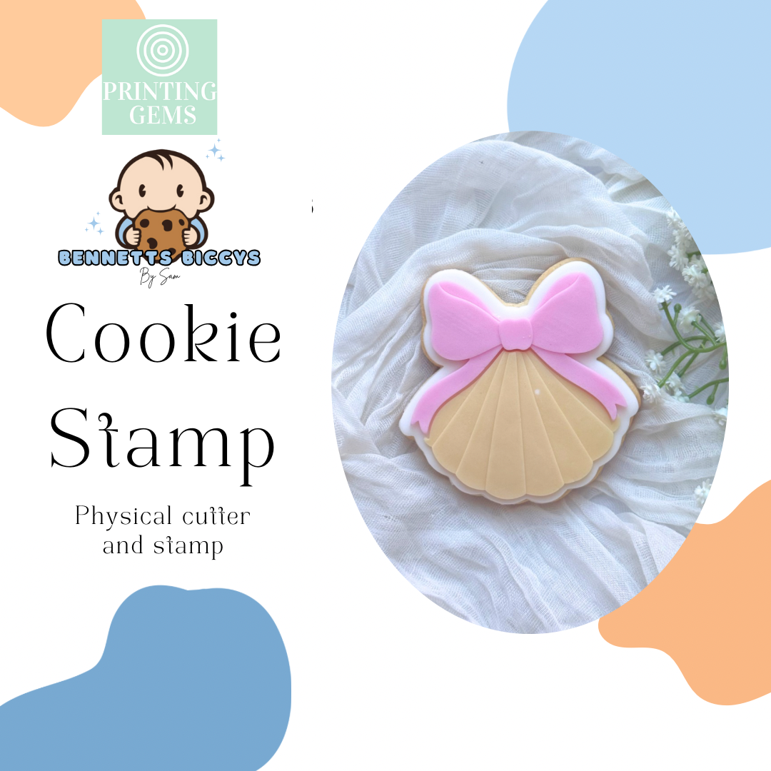 Clam shell with bow raised stamp by Bennets Biccys