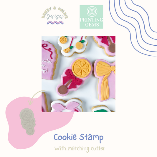 Orange rattle raised stamp by Honey & Goldie